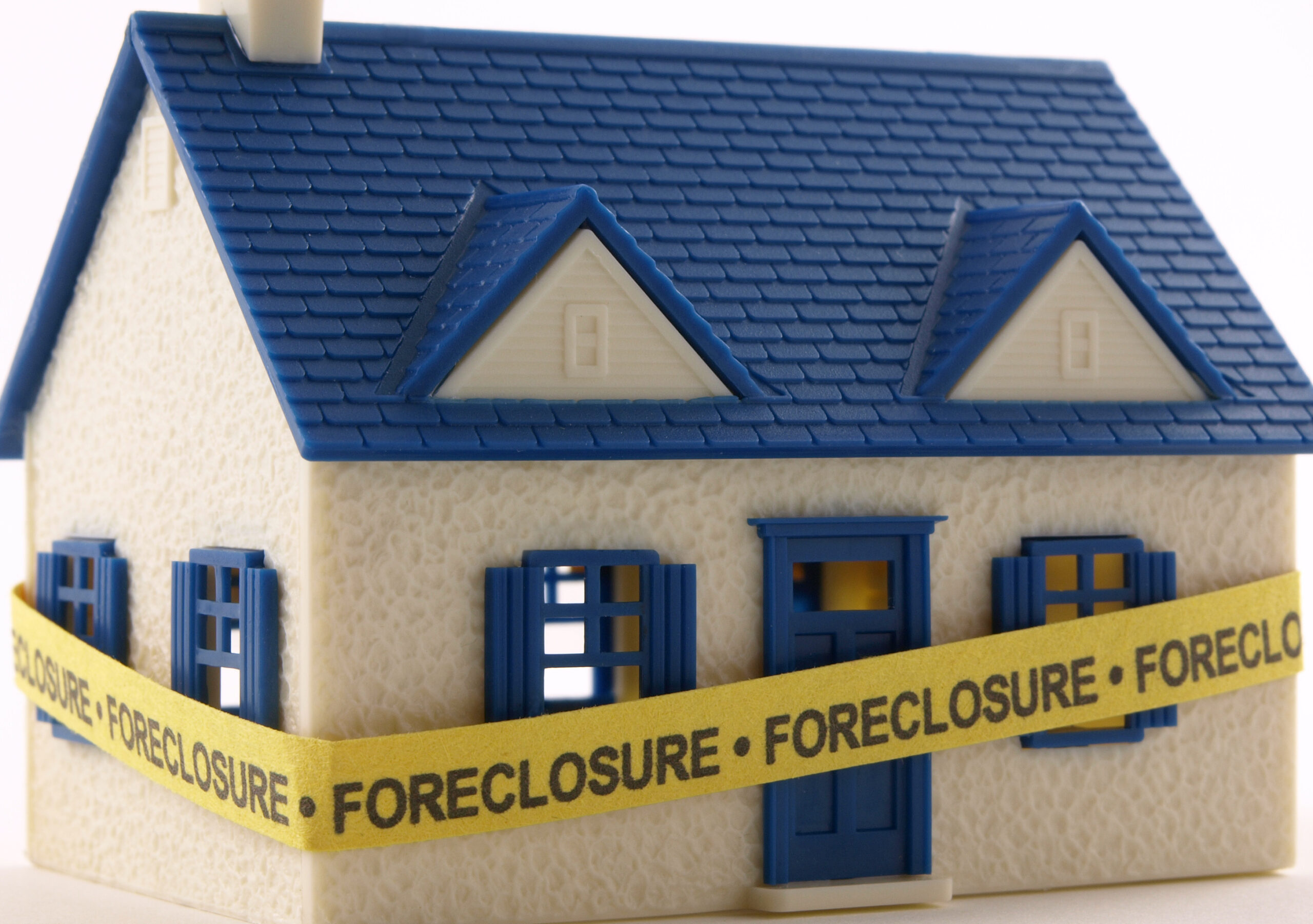 House with Foreclosure tape House with Foreclosure tape